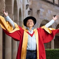 Li Cunxin AO in his graduation gown in the Great Court