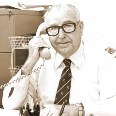 Bruce Green in his office on the telephone, 1980.