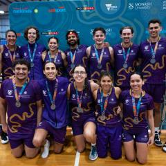 The UQ UniSport 2023 Indigenous Nationals champion team with medals.