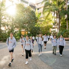 An image of InspireU camp participants walking around UQ's St Lucia campus.