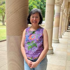 An image of Dr Poh Wah Hillocl standing in the Great Court at UQ.