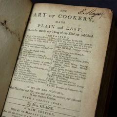 The inside cover and contents page of the Art and Cookery. The pages are browned and faded.