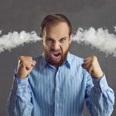 An image of an angry man with steam coming out of his ears.