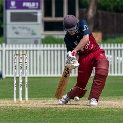 An image of UQ Cricket Club batsman Finn Churchward in action at the crease.