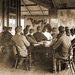 Students attend class on the verandah of the Foundation Building in 1902.