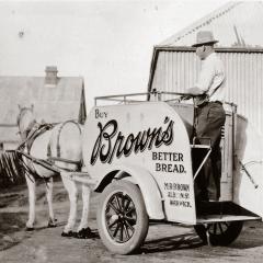 An image Judith Anderson’s grandfather Martin Brown standing on his delivery cart with horse in 1938.