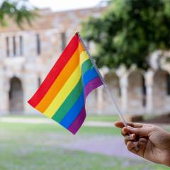An image the Pride flag in UQ's Great Court