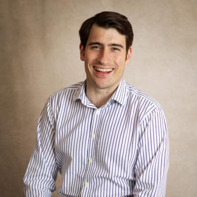 Daniel George smiling for professional headshot