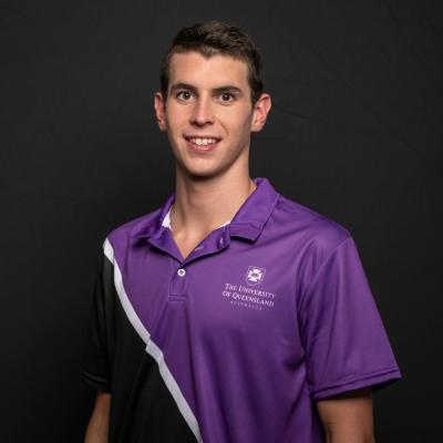 Thomas Neill headshot in UQ sports T-shirt