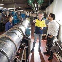 An image of Herik Lab team members working in a hypersonics lab.