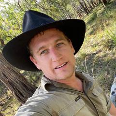 An image of journalist and Country Caller founder Harry Clarke on assignment in the bush