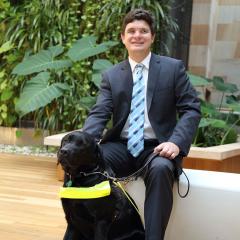 Associate Professor Paul Harpur with his late dog, Chester.