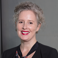 Image of a womans face - wearing red lipstick