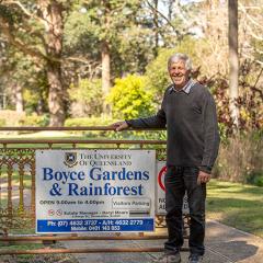 An image of Daryl Mears outside the gates of Boyce Gardens, which was gifted to The University of Queensland in 1969. 