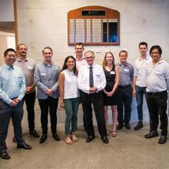 Rodney Gibson (centre) with past bursary recipients.