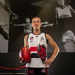 An image of UQ student and QAFLW player Jamie Howell